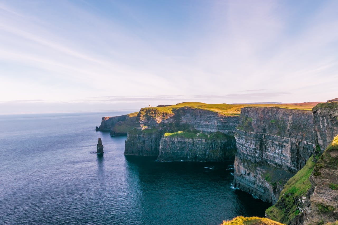 Breathtaking view of the Cliffs of Moher, an iconic Irish landmark in County Clare facing the Atlantic Ocean.